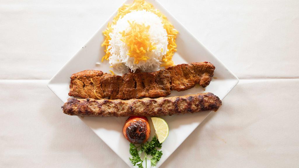 Kabob-E-Sultani · A combination of one skewer of kabob-e-barg and one skewer of kabob-e-kubideh with special seasoning.