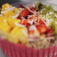 Tropical Pitaya Bowl · Vegetarian. Vegan. Pitaya Base: Banana, pineapple and coconut milk. Toppings: strawberry, ba...