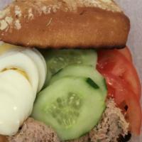 Tuna Salad Sandwich · Tuna, tomato, cucumber and boiled egg bread. Our tuna is mixed with onions, capers, parsley,...