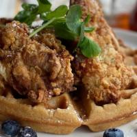 Chicken & Waffles · Crispy fried boneless chicken thighs,  belgian waffle, organic maple syrup
