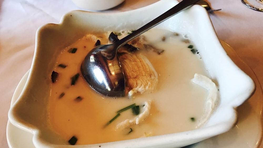 Tom Yum Gai · Spicy. Chicken, mushrooms, and onions seasoned with lime juice and lemon grass in a spicy chicken broth.