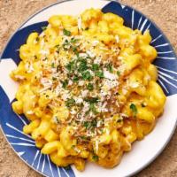 Truffle Mac & Cheese · Macaroni prepared with freshly made cheese sauce, beurre noisette, bread crumbs and white tr...