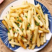 Truffle Fries · Crispy handcut fries with sea salt and white truffle essence.