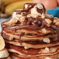 Nutella Banana Pancakes · 5 stack of pancakes with Nutella, and bananas
