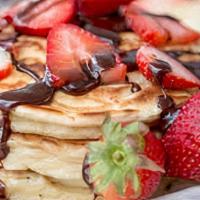 Nutella Strawberry Pancakes · 5 stack of pancakes with Nutella, and strawberries