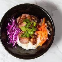 Rice Bowl (White Or Brown) · Choice of protein over jasmine rice with lettuce, pickled carrots, daikon and red cabbage, c...