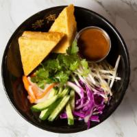 Salad Bowl · Seasonal mixed salad, pickled carrots, daikon and red cabbage with peanut dressing.