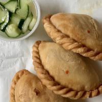 Chicken Curry Puffs (3) · Minced chicken, sweet potatoes and curry power stuffed in homemade pastry served with cucumb...