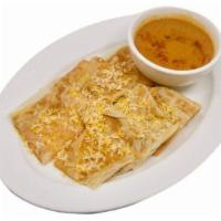 Roti Cheese Quesadillas 起司面包 · Spicy. Roti with melted cheese. Served with curry potato chicken sauce.