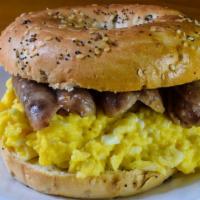 2 Eggs Sandwich With Sausage · Delicious Breakfast sandwich topped with 2 cooked eggs and a sausage patty. Served on custom...