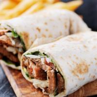 Mediterranean Wrap · Delicious Breakfast Wrap made with Eggs, roasted peppers, feta cheese, Parmesan cheese and b...