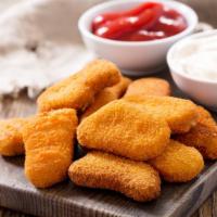 Chicken Nuggets · 6 pieces of delicious chicken nuggets breaded and fried to perfection.