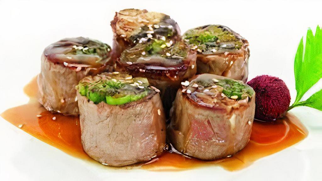 Beef Negimaki · Beef negimaki beef rolled w/ scallion grilled.