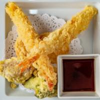 Tempura App · Fried shrimp & vegetable w/ tempura dipping sauce.