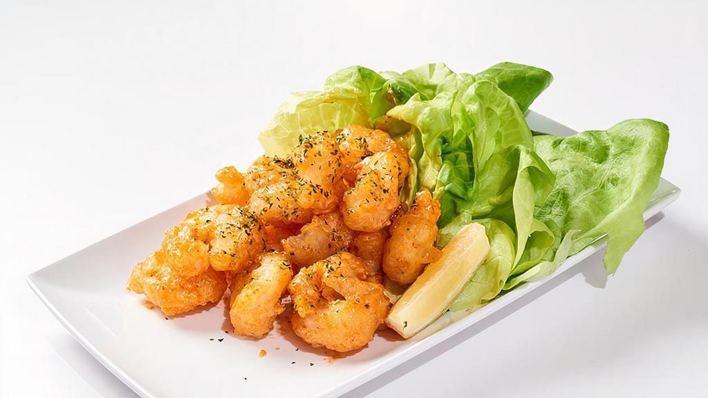 Rock Shrimp · Lightly batter baby shrimp w/ chef's spicy sauce.