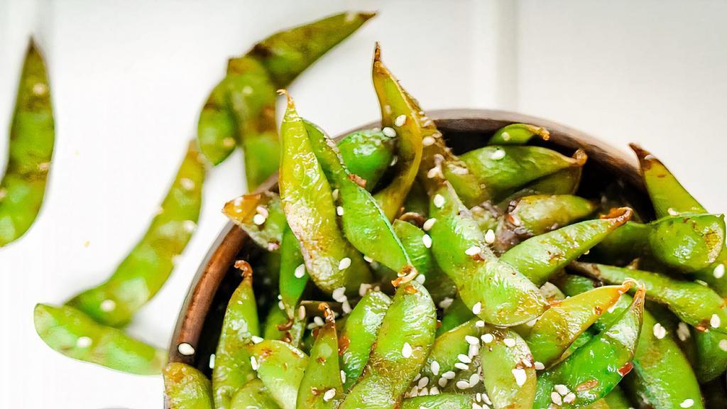 Spicy Garlic Edamame · Boiled soybeans tossed with spicy garlic sauce.