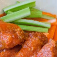 10-Piece Wings · Served with carrots, celery sticks and bleu cheese dressing.