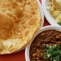 Chhole Bhature · 2 Fried Flatbreads served with chickpeas