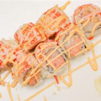 Dynamite Roll · Spicy yellowtail and spicy tuna topped with spicy crunchy crab meat.