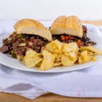 Philly Cheesesteak Sandwich · With onions and cheese.