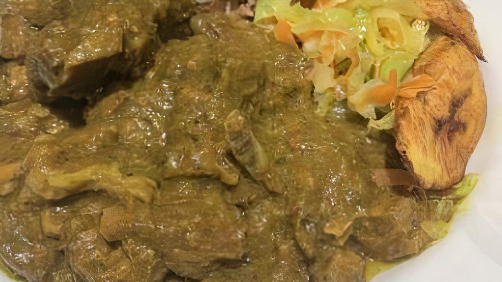 Curried Goat · tender pieces of goat meat slow cooked & simmered in a spicy curry sauce.