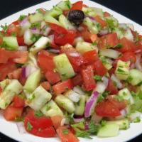 Coban Salatasi / Shepherd Salad · Fresh chunks of tomatos, cucumbers, onions, parsley mixed in virgin olive oil and vinegar.