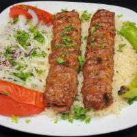  Adana Kebab / Skewered Ground Meat · Charcoal broiled lamb patties marinated with our chef's seasoning.