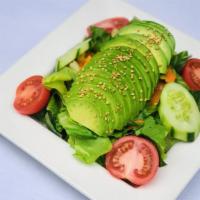 House Salad Avocado · Ginger dressing.