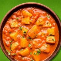 Aloo Gobhi · Vegan, gluten free. Tender cauliflower and potatoes sautéed with tomatoes and onions and ser...