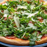 Brigante Pizza · Tomato sauce, mozzarella for di latte, prosciutto di parma, rucola and shared parmigiano reg...
