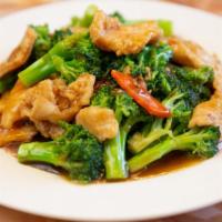 Chicken With Broccoli · It comes with white rice.