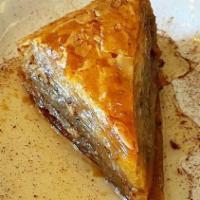 Baklava · Phyllo dough layered with chopped walnuts, cinnamon, and honey syrup.