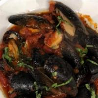 Mussels Marinara · A generous portion of mussels served in a sweet or spicy marinara sauce.