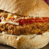 Chicken Parmigiana Hero · Breaded, golden fried chicken cutlet layered with our house marinara and loads of melty mozz...