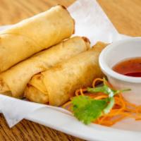 Crispy Spring Roll (4) · Deep-fried mix vegetable and glass noodle wrapped in egg roll skin served with plum sauce.