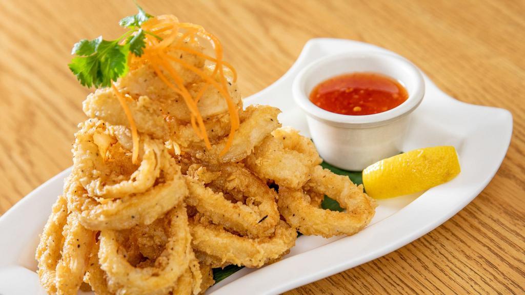 Golden Calamari · Crunchy calamari served with sweet chili sauce.