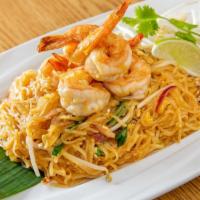Pad Thai · A signature dish of Bangkok street food with thin rice noodle stir-fried with egg. Bean spro...