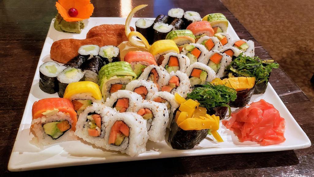 Vegetable Sushi For 2 (Ve) · Vegan - 6 pcs of assorted veggie sushi, avocado roll, mango roll, cucumber roll, papaya kiwi roll, vegetable roll & vegetable rainbow roll. Served with two garden salads and housemade Vegetarian salad dressing on the side