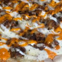 Cajun Chicken Ranch · Chicken cutlet tossed in a Cajun dressing with melted mozzarella and topped off with a drizz...