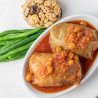 Stuffed Cabbage Dinner · Seasoned Chopped Meat & Rice, wrapped in Cabbage, Smothered in a Tangy Sweet & Sour Sauce.