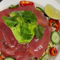 Ahi Ponzu Tostada · Fresh Hawaiian Sashimi (Ahi)
with Cabbage,Avocado,Cucumbers
Chipotle Dressing