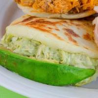 Arepa Reina Pepiada · Chicken, avocado, and cheese. Pollo, aguacate y queso (chicken, avocado and cheese ).