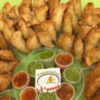 Party Platter 50 Mini Tequenos: Queso · Fifty white flour mini empanadas and mini tequenos. Per each order..