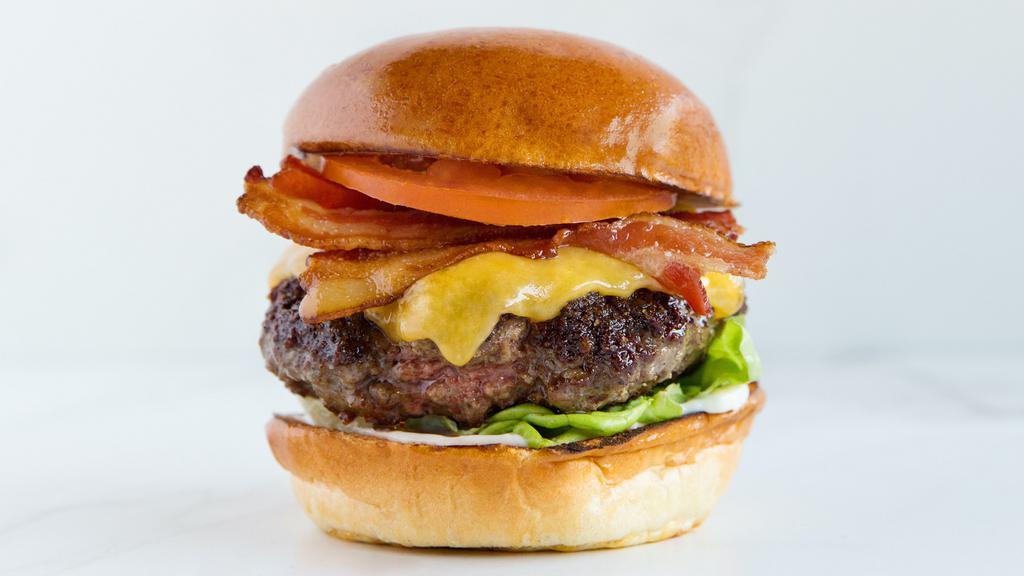 Perch Burger · red onion marmalade, bacon, bibb lettuce, tomato, cheddar, secret sauce, french fries