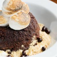 Chocolate S'Mores Cake · toasted meringue, graham cracker crumble