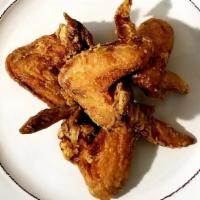 Fried Chicken Wings · Three pieces.