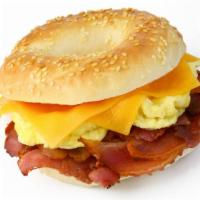 Bacon, Egg & Cheese Bagel Sandwich · Fresh piece of bacon, cheese and eggs on bagel sandwich.