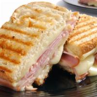 The Swiss Grilled Cheese · Exquisite grilled sandwich with swiss cheese.