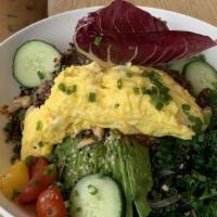 Brekkie Bowl · Organic sliced avocado, sautéed spinach and kale, quinoa, two eggs
