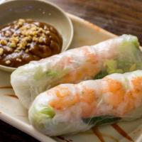 Shrimp Summer Roll (2) · Shrimp, lettuce, mint leaves, vermicelli, rice paper wrap, peanuts, and hoisin sauce.
